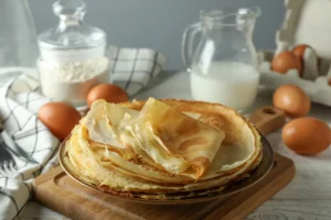 Discover the simplicity of turning pancake mix into light, versatile crepes, perfect for both sweet and savory fillings, in our step-by-step guide