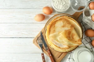 Discover the simplicity of turning pancake mix into light, versatile crepes, perfect for both sweet and savory fillings, in our step-by-step guide